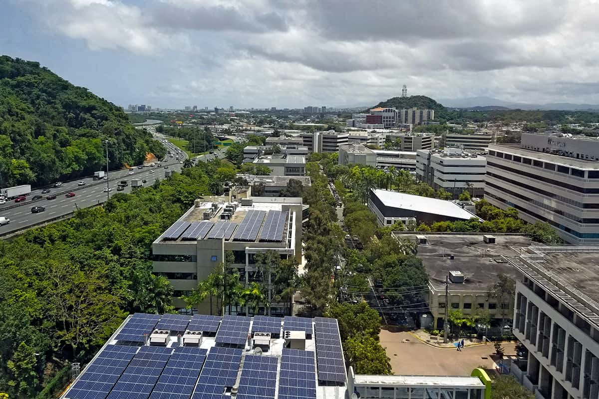 Urban city with cloudy sky